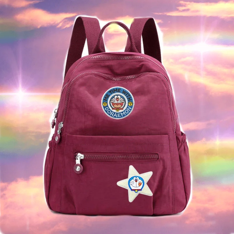 

Мужская модная повседневная сумка для путешествий с мультяшным принтом, школьная сумка, сумка через плечо с изображением кота Динданга, женская новая модная нейлоновая сумка с изображением Дораэмон.