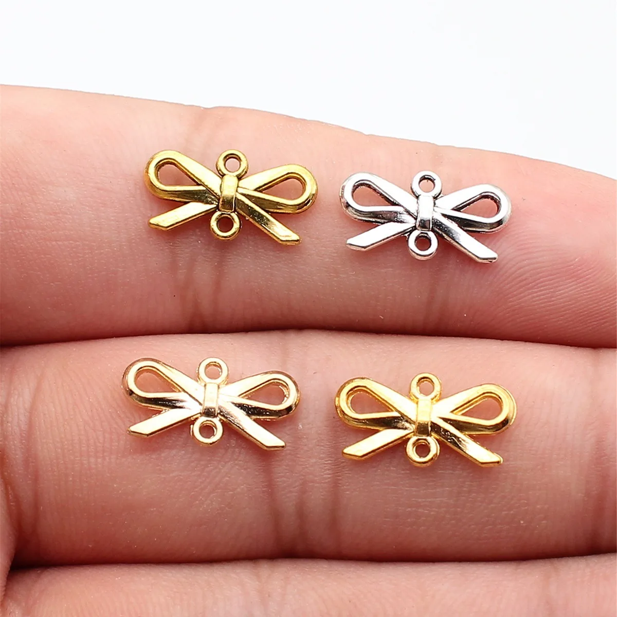 WYSIWYG 40 piezas de 16x8mm, Conectores de lazo para fabricación de joyas, Fornituras de joyería DIY, 4 colores, Dijes de aleación de zinc