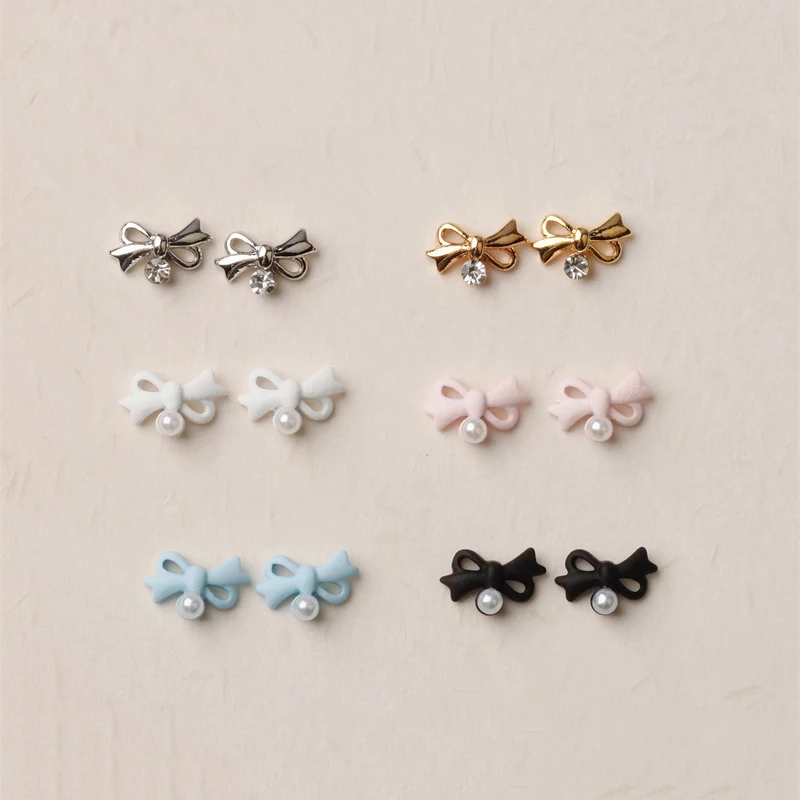 20 pezzi decorazione fai da te squisita decorazione per unghie strass accessori fascino per unghie mini ciondoli per unghie fiocco artistico in lega con perle