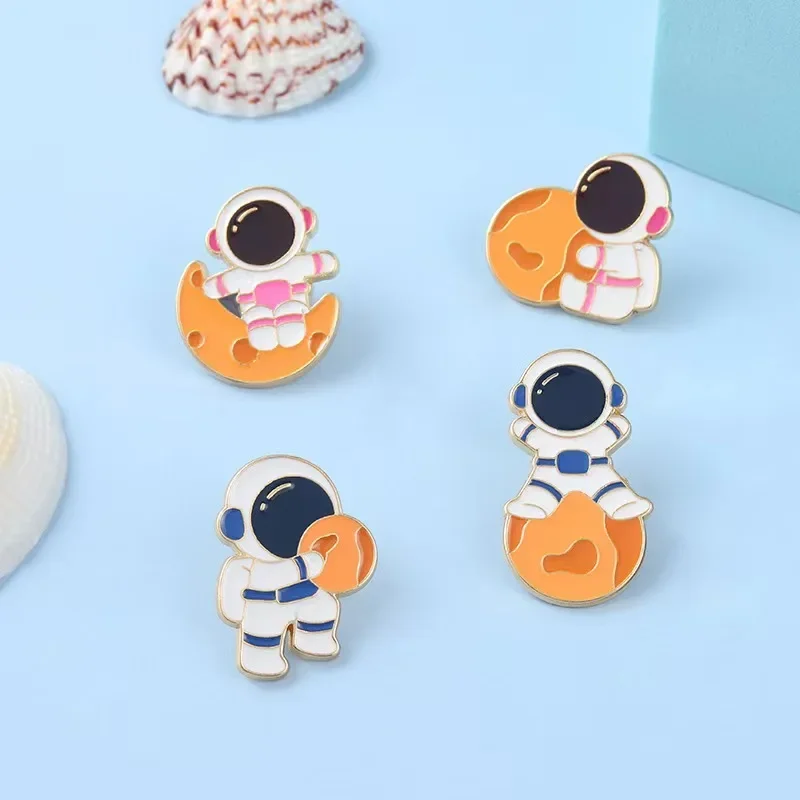 Astronaut on Planet Enamel Pins Bule Pink Cartoon Brooch Accessories Backpack Pin Badge Jewelry Gift for Women Men Wholesale