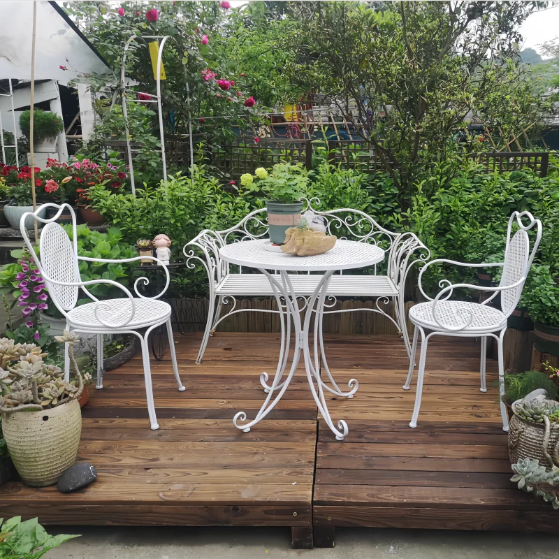 

Outdoor garden French wrought iron table and chair outdoor retro outdoor courtyard leisure creative three-piece combination tabl