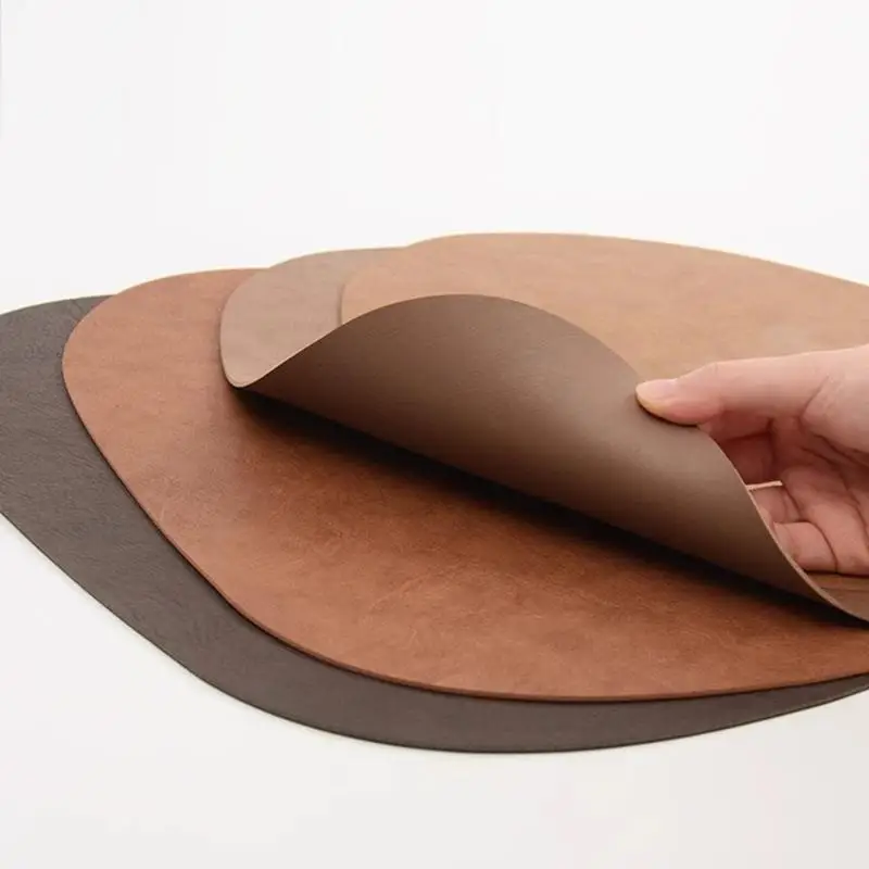 

Trendy Irregular PU Leather Placemat And Coaster Waterproof And Oil-Proof Table Mats Western Restaurant Heat-Insulating Mats
