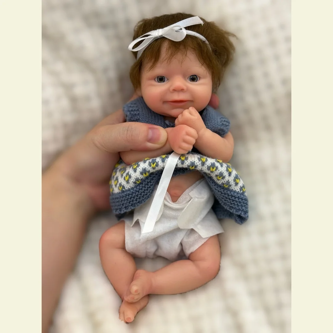 10Inch Open Eyes Soft Silicone Bebe Reborn Girl With Rooted Hair Dress in Sweather Outfits Lifelike Realistic Newborn Doll