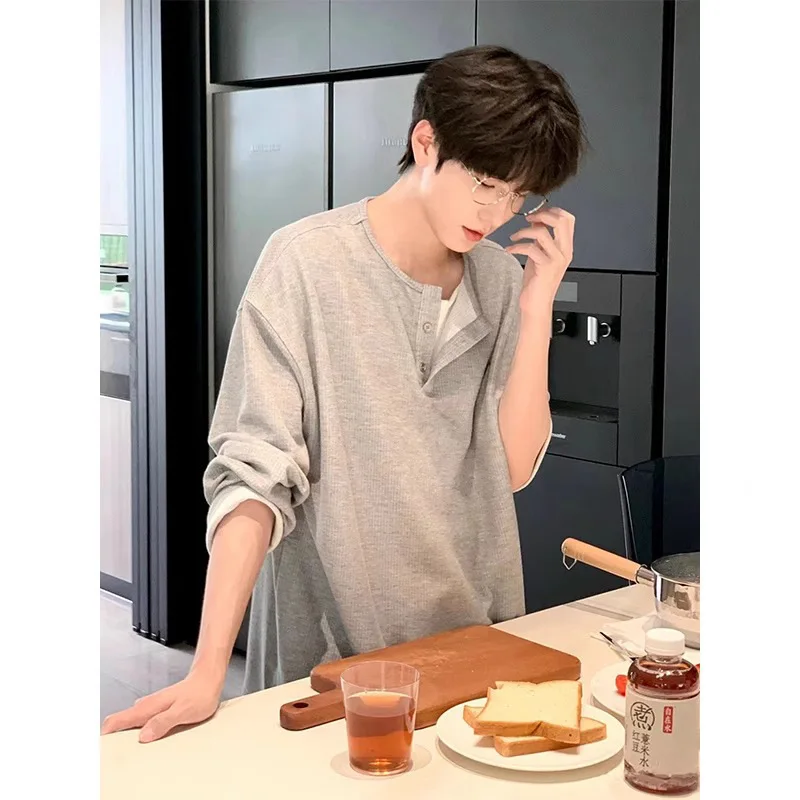 Fake two pieces v-neck long-sleeved sweater men's spring and autumn lazy Korean ruffian handsome niche design bottoming shirttop