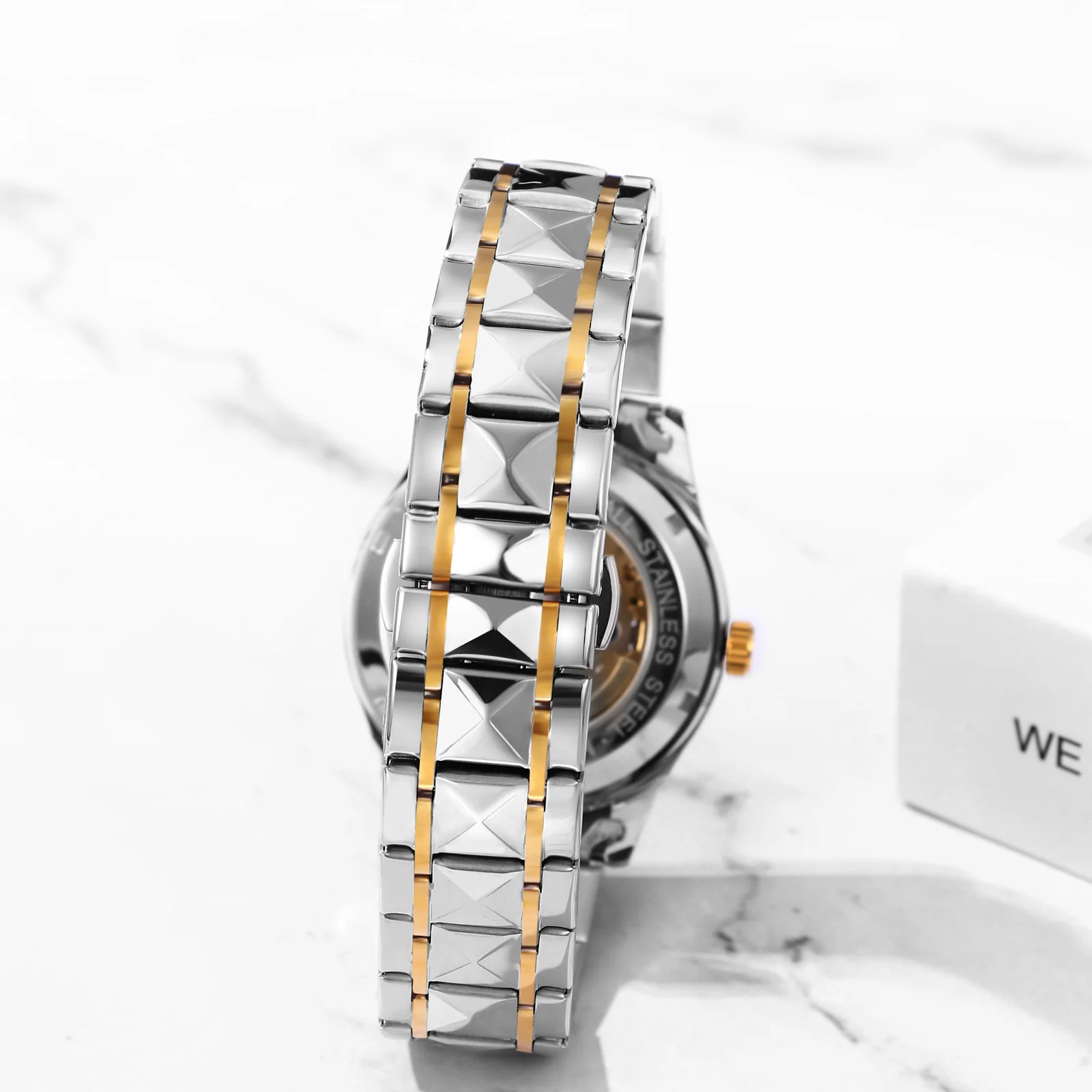 นาฬิกาผู้ชายธุรกิจแฟชั่นสายสแตนเลสหน้าปัดนาฬิกากลไกอัตโนมัติติดเพชรเรืองแสง