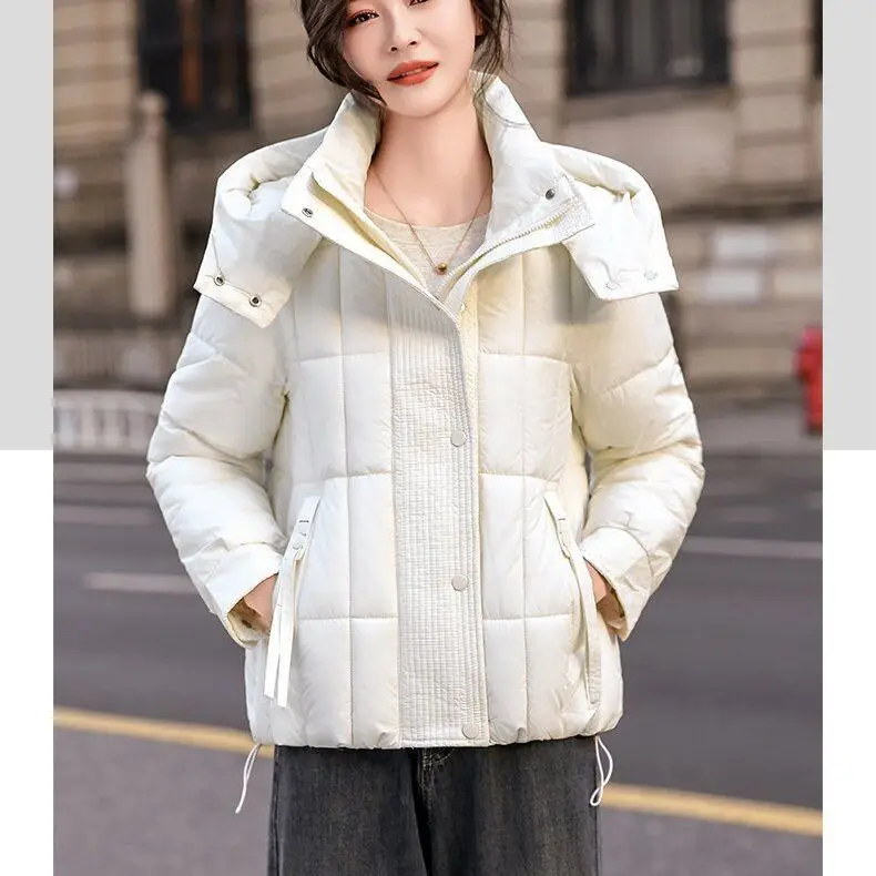 سترة نسائية لخريف وشتاء 2025 من القطن للتنقل مع غطاء للرأس ومقاومة للرياح