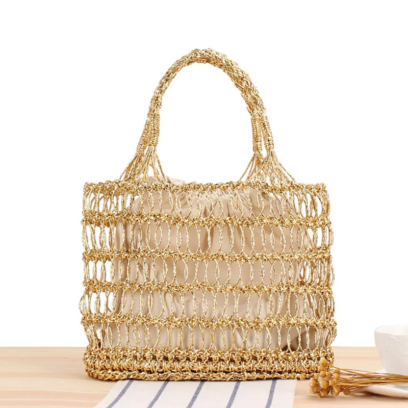 Ins new gold and silver thread hollow hand hook woven bag tide girl Sen holiday beach portable straw woven bag