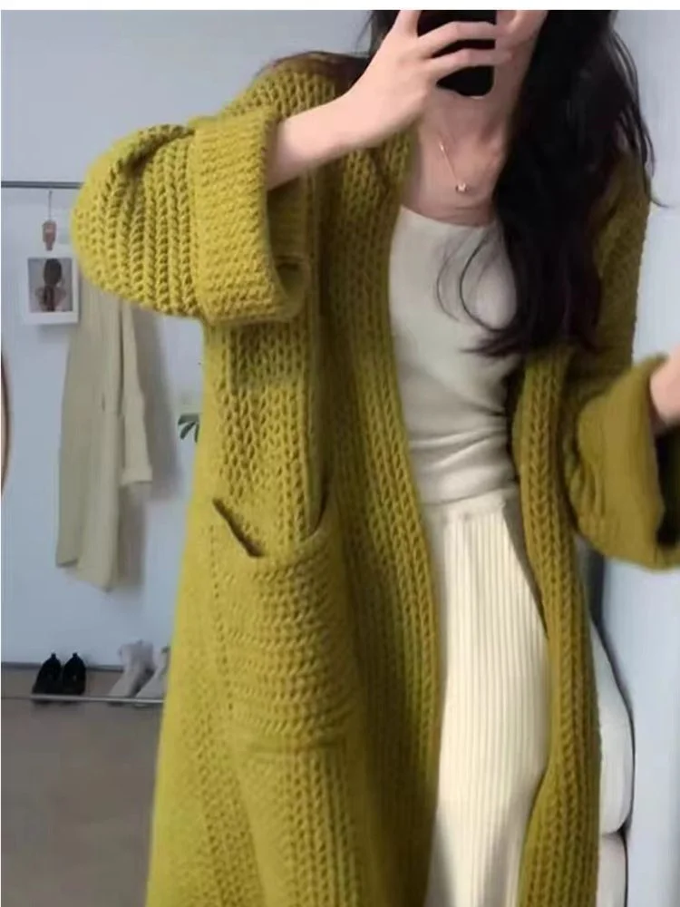 Side profile demonstrating drape of flounce hem and waist cinch effect on garment silhouette