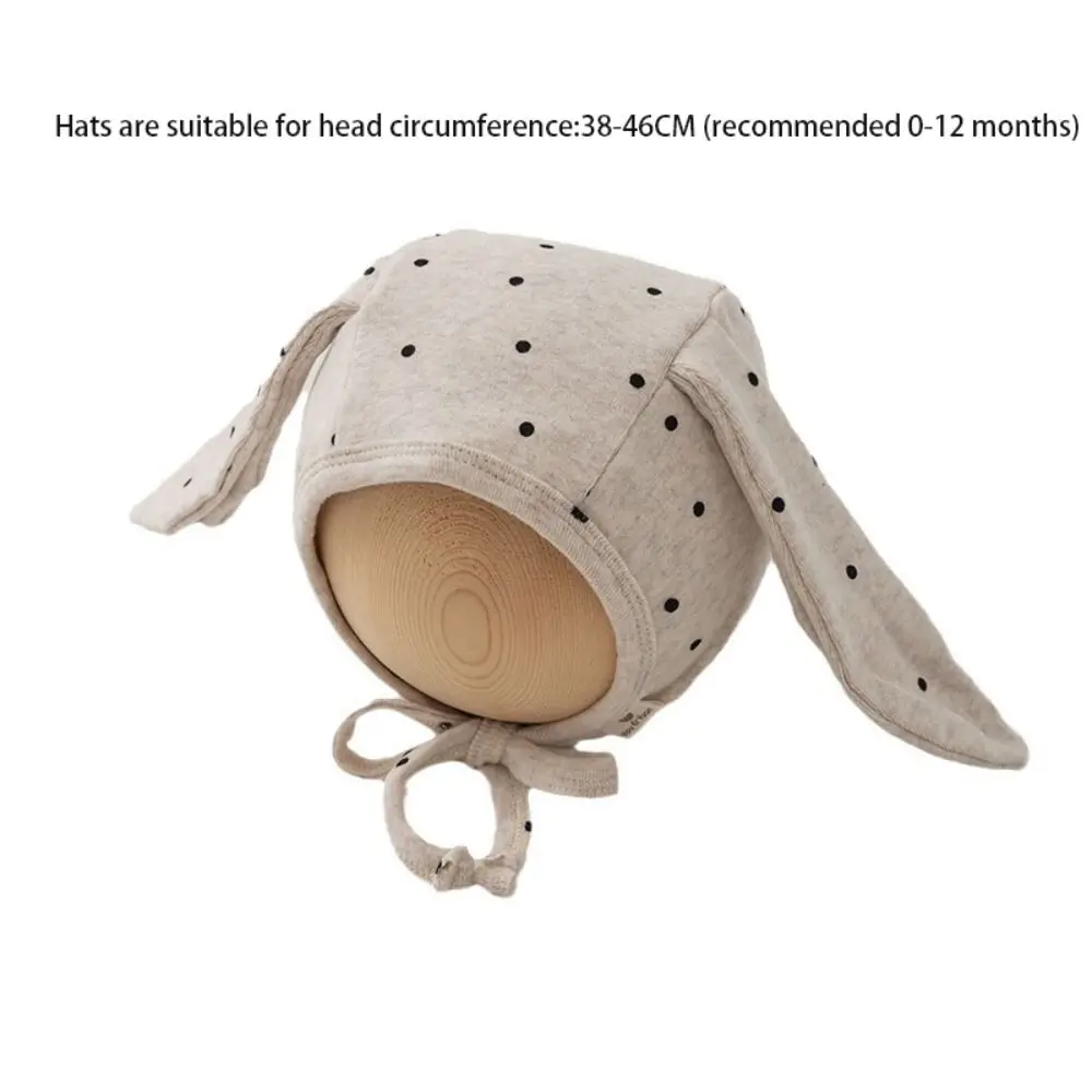 Gorro Fetal para bebé Ins, gorro con orejas de conejo para recién nacido con lunares de dibujos animados, gorro con correa para corbata, gorro infantil dulce para niños y niñas