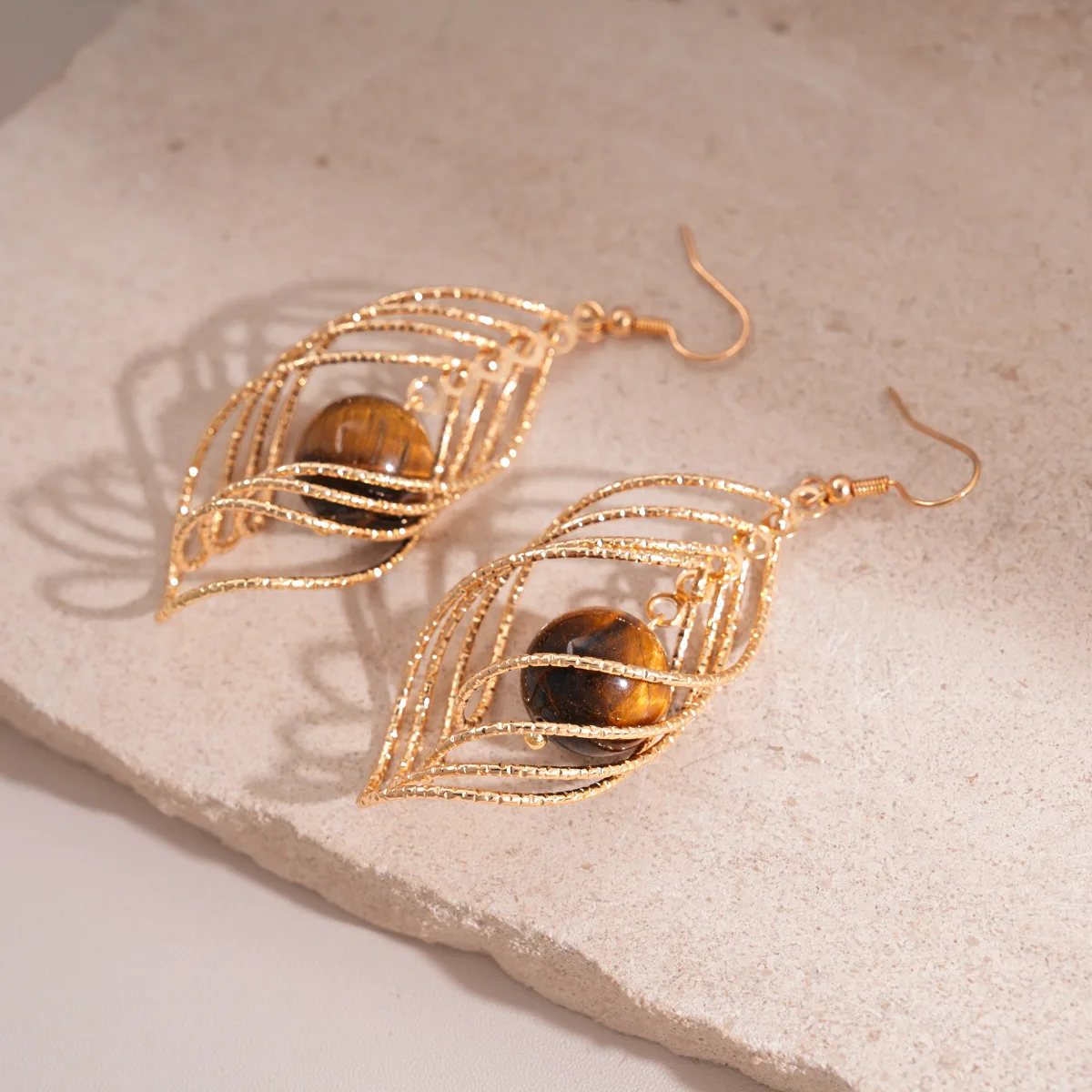 Retro coffee color tiger's eye stone twisted rhombus earrings light luxury high-end earrings fashionable personalized earrings
