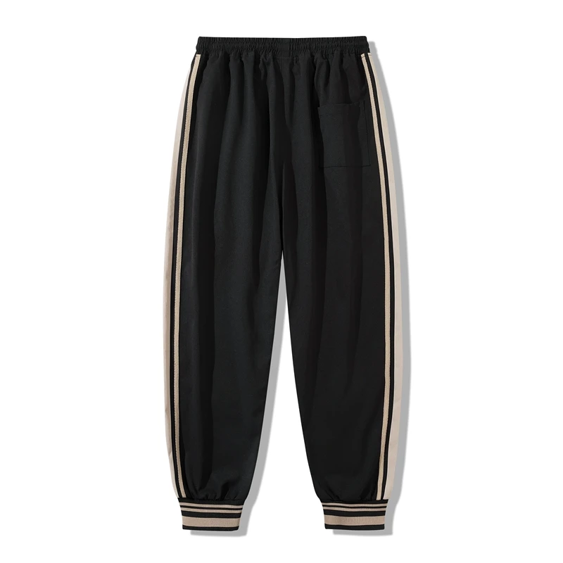 Pantaloni sportivi autunnali da uomo pantaloni Patchwork laterali moda pantaloni da uomo di alta qualità pantaloni larghi da Jogging Casual Streetwear