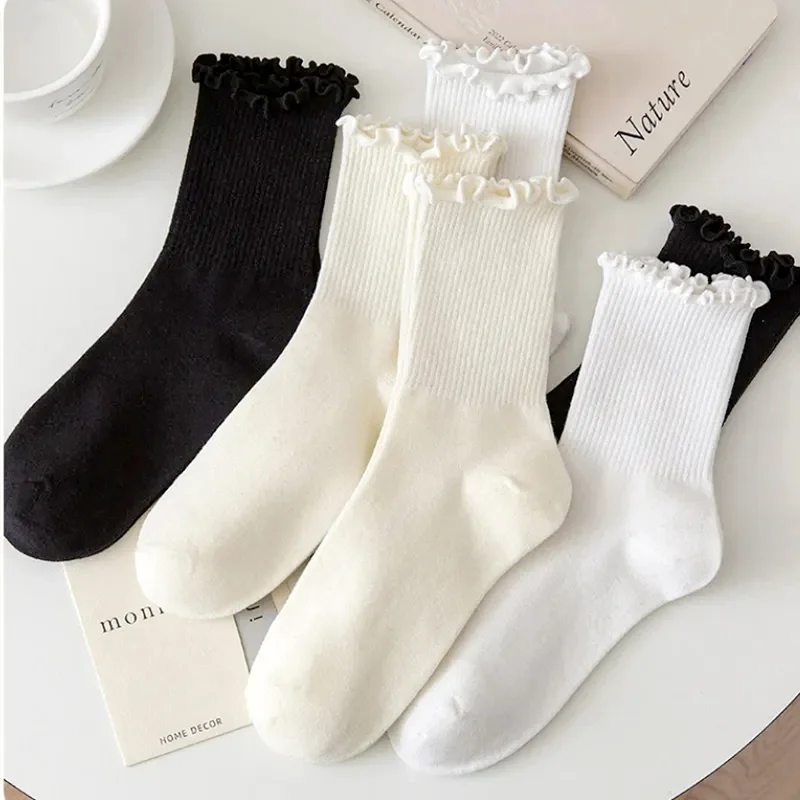 Chaussettes à volants en coton pour femmes, INS Fashion, été, mignon, Kawaii, monochromatique, luxe, coréen, japonais, rinçage, fille, printemps, noir, blanc, tube moyen