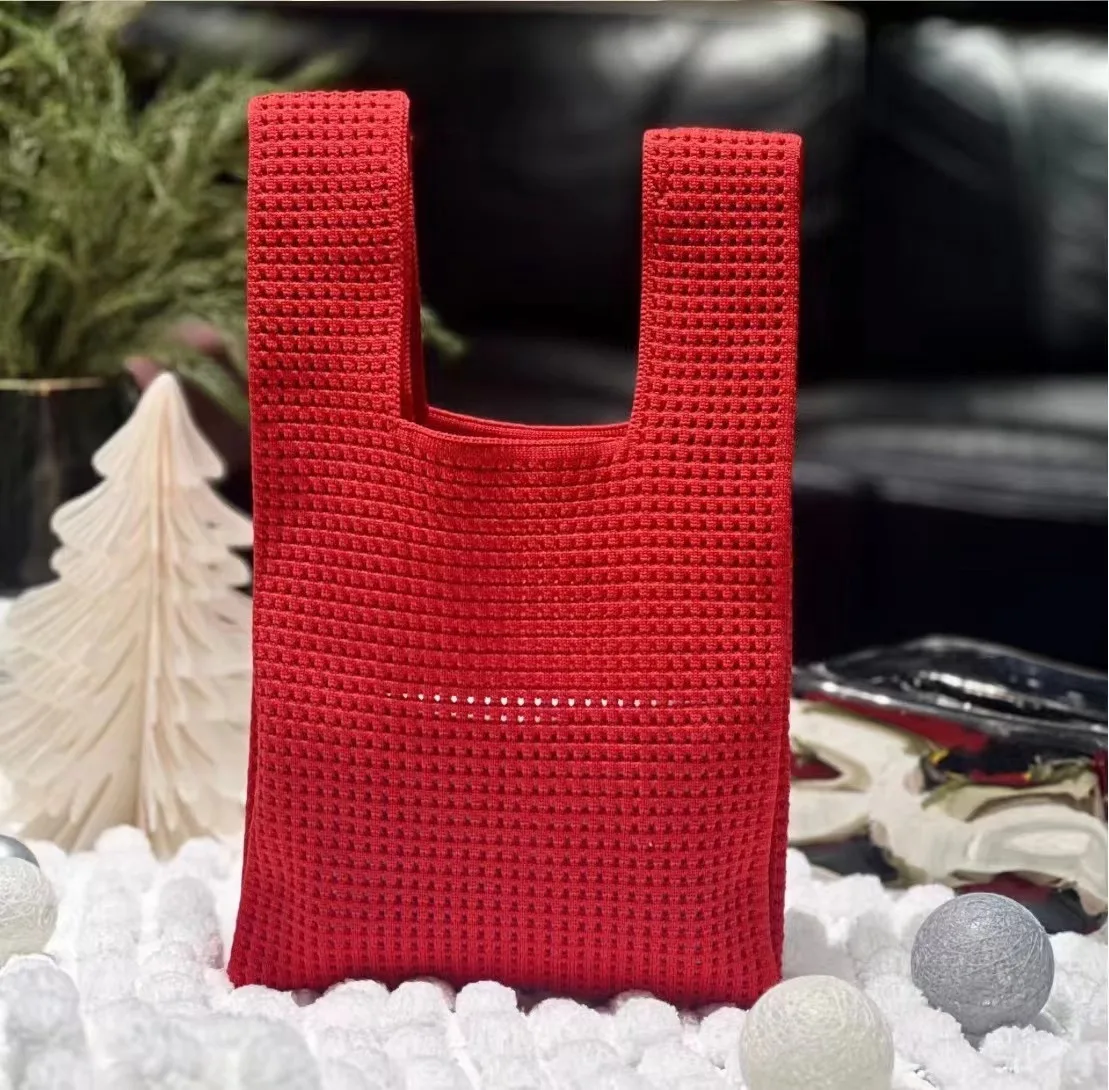 Bolso de mano de punto para mujer, bolsa de cubo de agua hueca, versátil, de muñeca Simple, para vacaciones, 2024