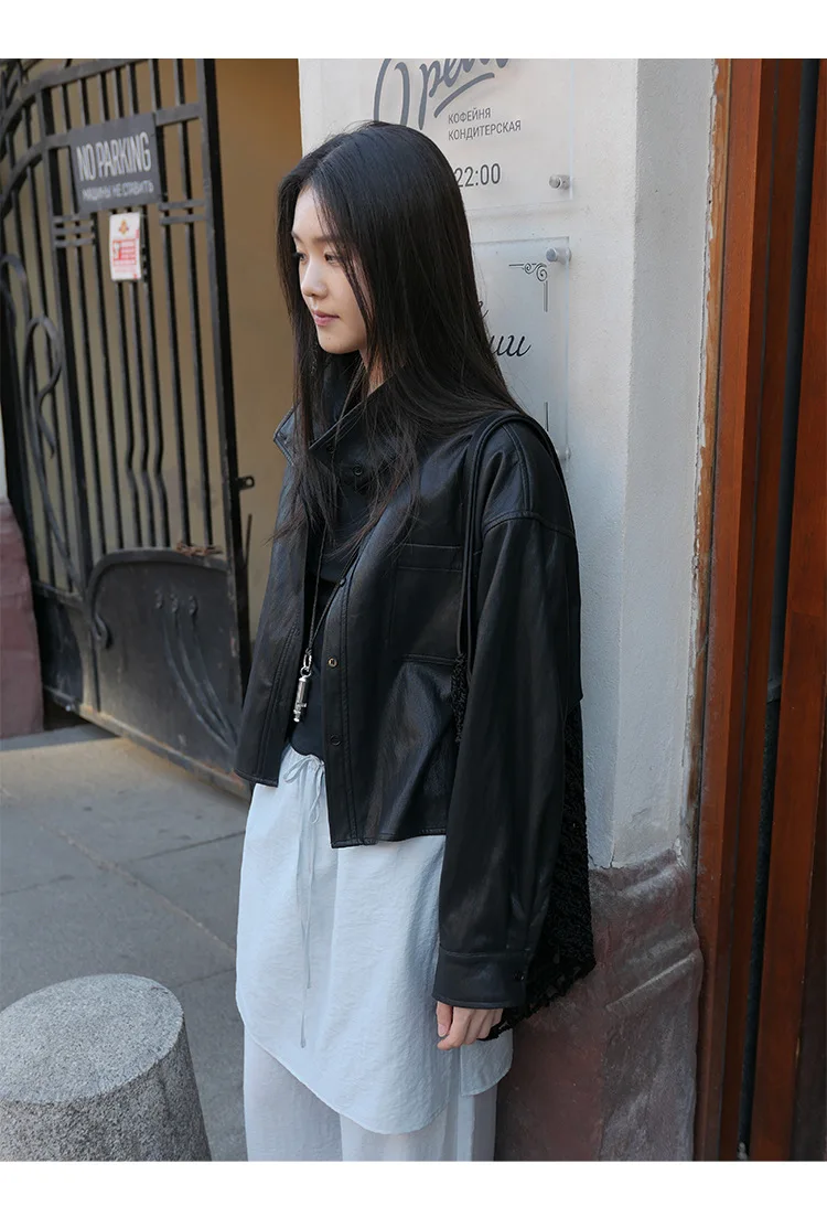 

Autumn and winter women's casual solid color stand up collar long sleeved loose jacket