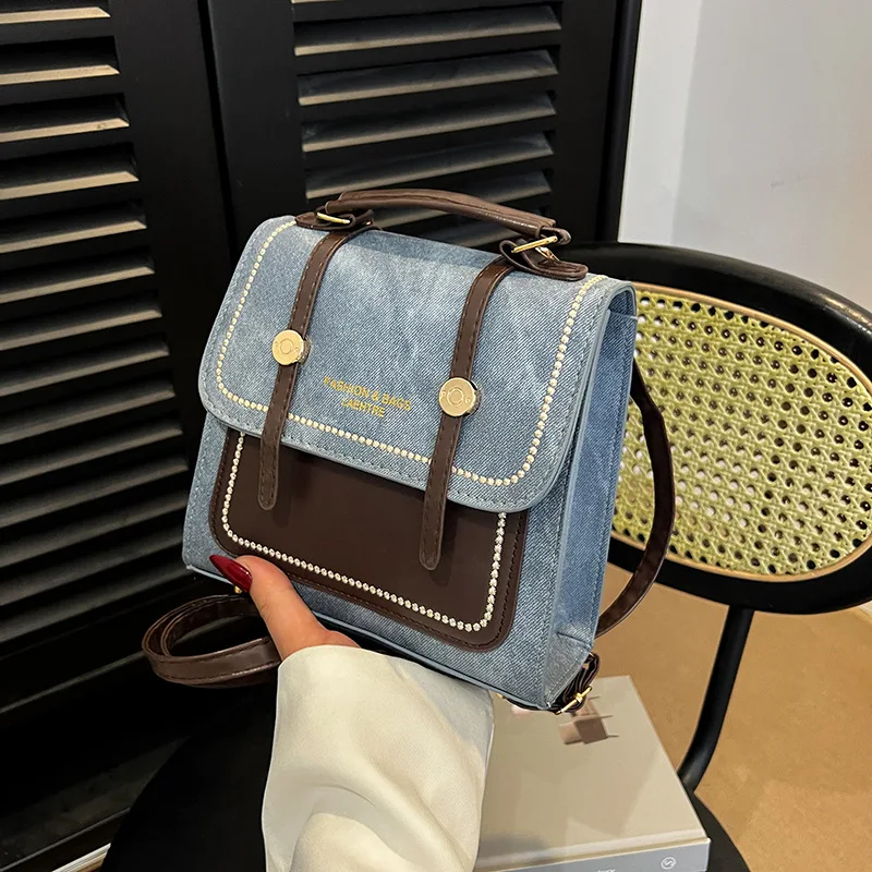 

Ретро-рюкзак 2026: Новая модная студенческая модель большой вместимости, повседневная многофункциональная сумка для города, ручная/наплечная сумка для поездок