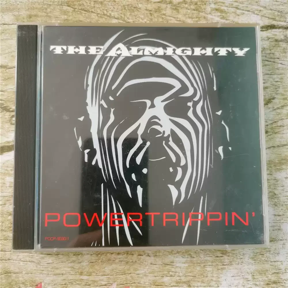 قرص مضغوط The Almighty Powertrippin ألبوم هارد روك/معدني ثقيل تم إصداره فرقة الروك البريطانية The Almighty في عام 1993 #2