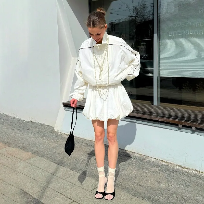 Quick-drying sports suit turtleneck long-sleeved contrasting coat drawstring bud short skirt two-piece women's clothing