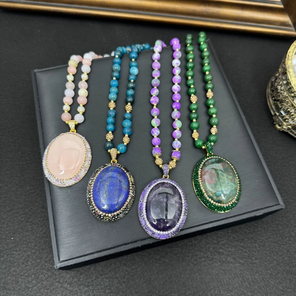 

Law of Attraction Jade Pendant – Natural Egg Shape with Full Crystal Inlay To Harmonize All 7 Chakras & Manifest Dreams