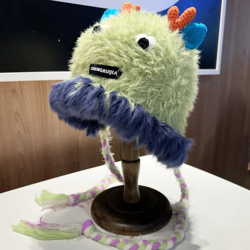 

Handwoven cute little monster straps knitted cold hat children autumn and winter rabbit wool warm ear protector Lei Feng hat