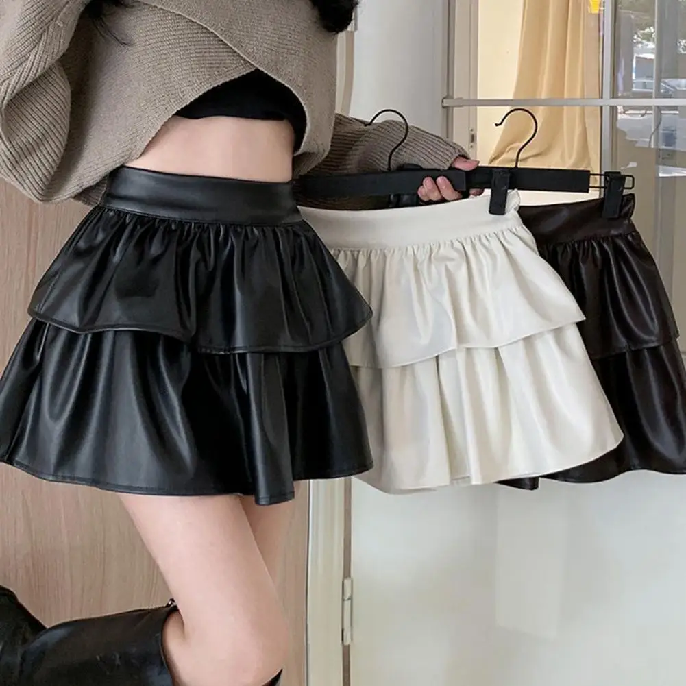 

2026 Женская короткая юбка со складками по подолу, однотонная, с высокой талией, свободная, элегантная, повседневная одежда, корейский стиль, весенне-осенняя юбка из искусственной кожи