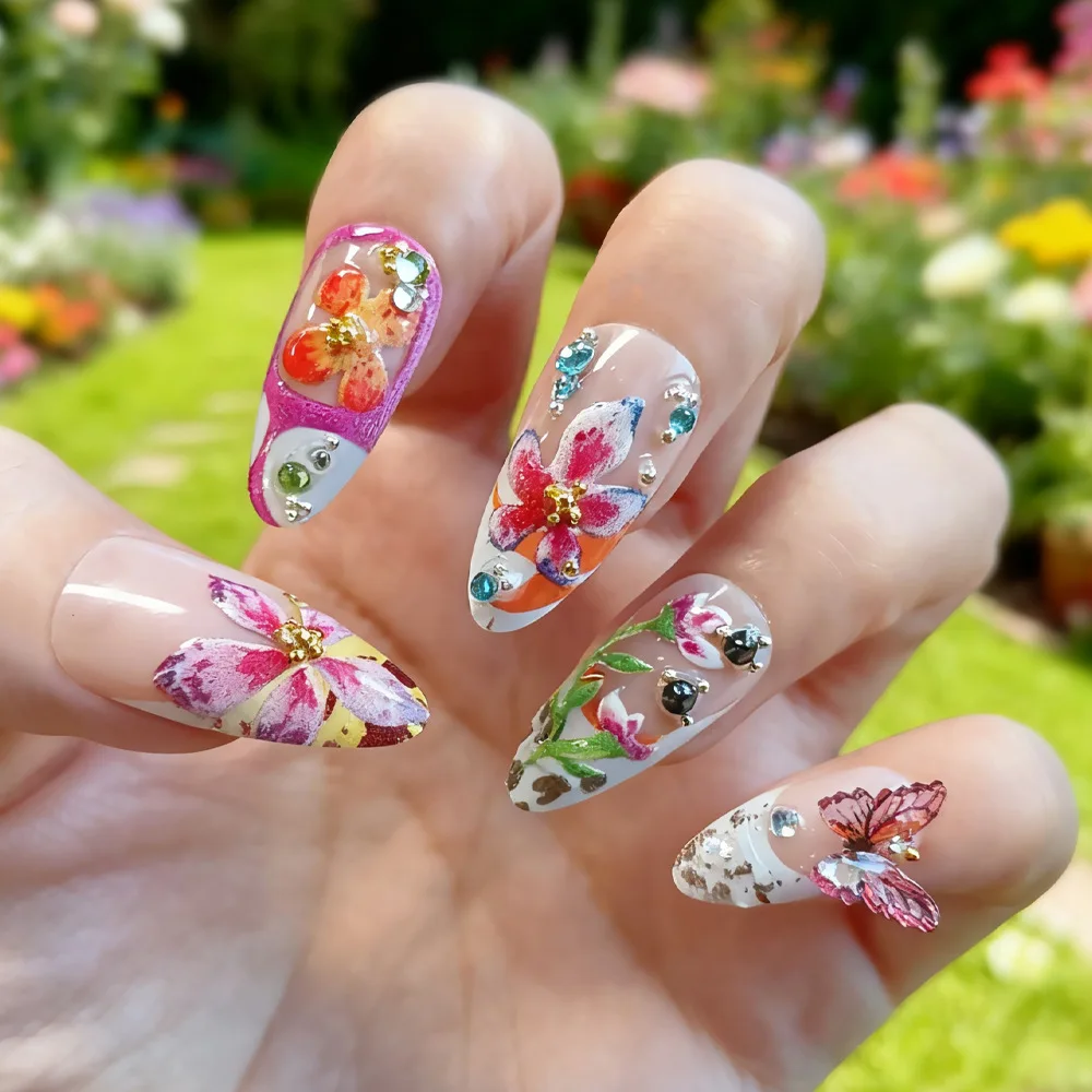

24Pcs Medium Almond Press on Nails - 3D Embossed Flowers with Rhinestones, Green Leaves, Colorful Blooms and Butterflies