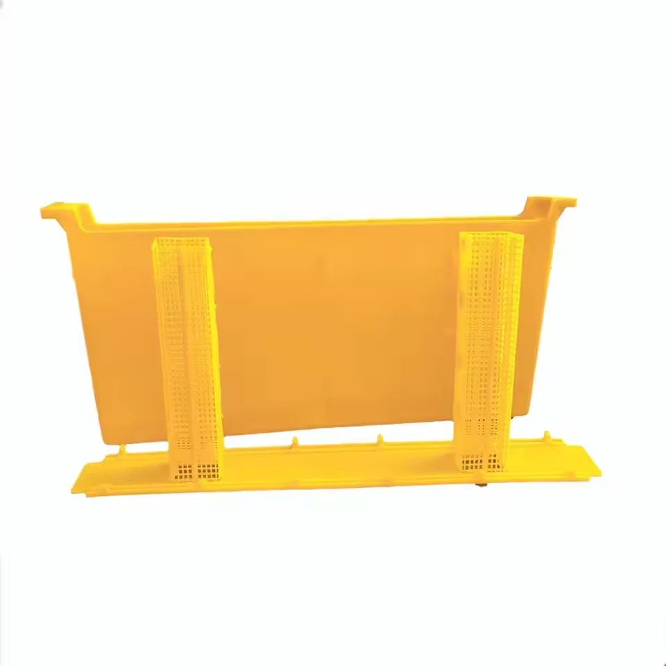 Plastic beekeeping tools, yellow honeycomb frame and feeder