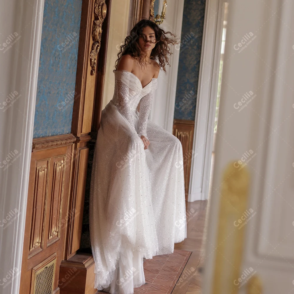 

Блестящие свадебные платья Великолепные свадебные платья Аппликации с блестками Халаты с открытыми плечами Довольно индивидуальные платья Vestidos De Novia 2025