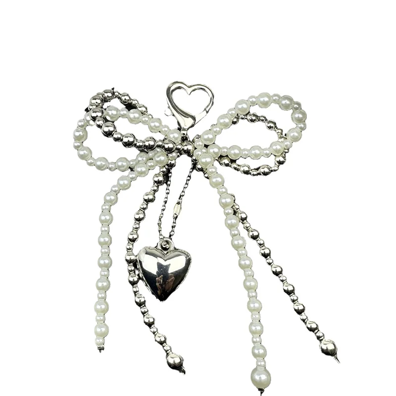 حقيبة جديدة على شكل فيونكة لؤلؤية على شكل قلب مصنوعة يدويًا لحقيبة الهاتف وحقيبة الملابس والأحذية وإكسسوارات الحقائب