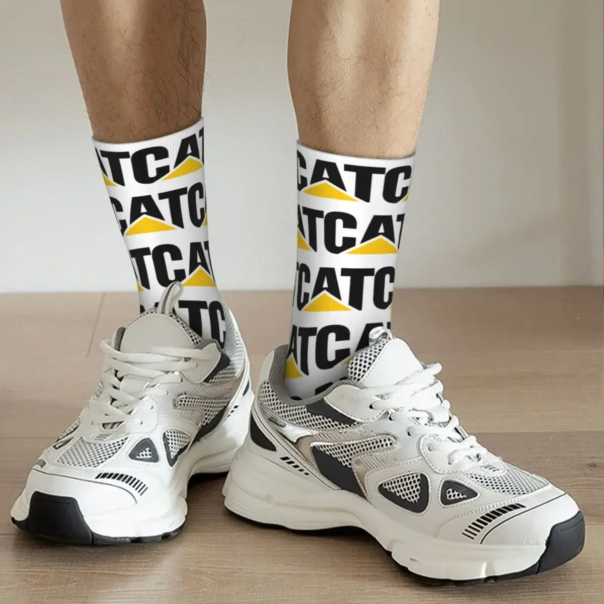 Calcetines largos con logotipo de caterpillar para hombre y mujer, medias Harajuku de alta calidad, accesorios para todas las estaciones, regalo de cumpleaños