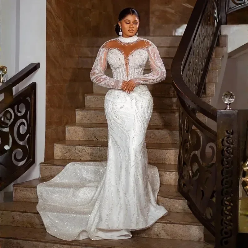 ชุดแต่งงานเจ้าสาวทรงเมอร์เมดแบบสั่งตัดพิเศษจาก Flavinke ปี 2025 คอสูง แขนยาว สำหรับผู้หญิงผิวสีชาวแอฟริกัน แต่งลูกไม้