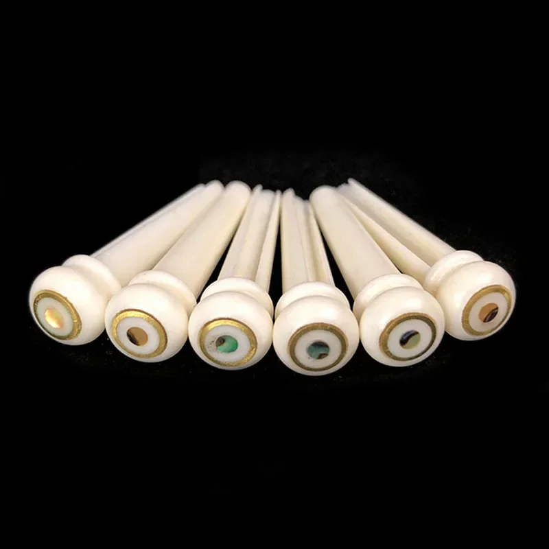 

30Pcs Bone Acoustic Guitar Bridge Pins Pure Cattle Bone Pressure String Nails with Brass Circle and Green Abalone Dot Wholesale