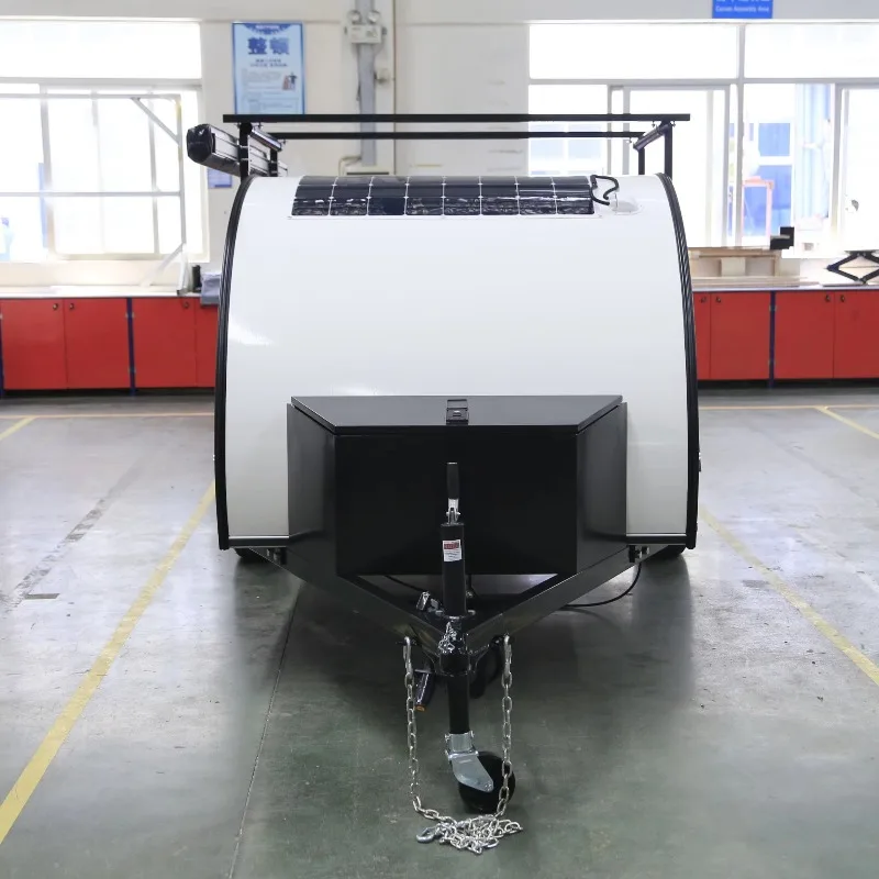Light teardrop-shaped camping trailer for easy traction, suitable for weekend vacations, optional roof tent