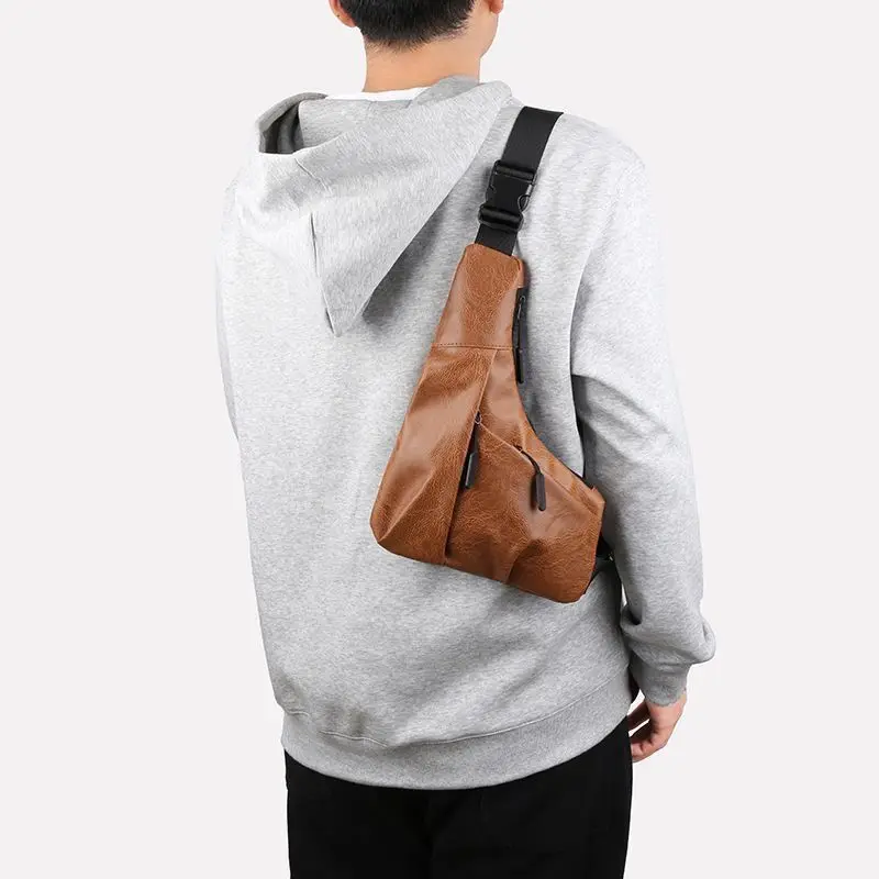 A sleek and lightweight waterproof PU material backpack, a versatile messenger bag for men's sports and leisure