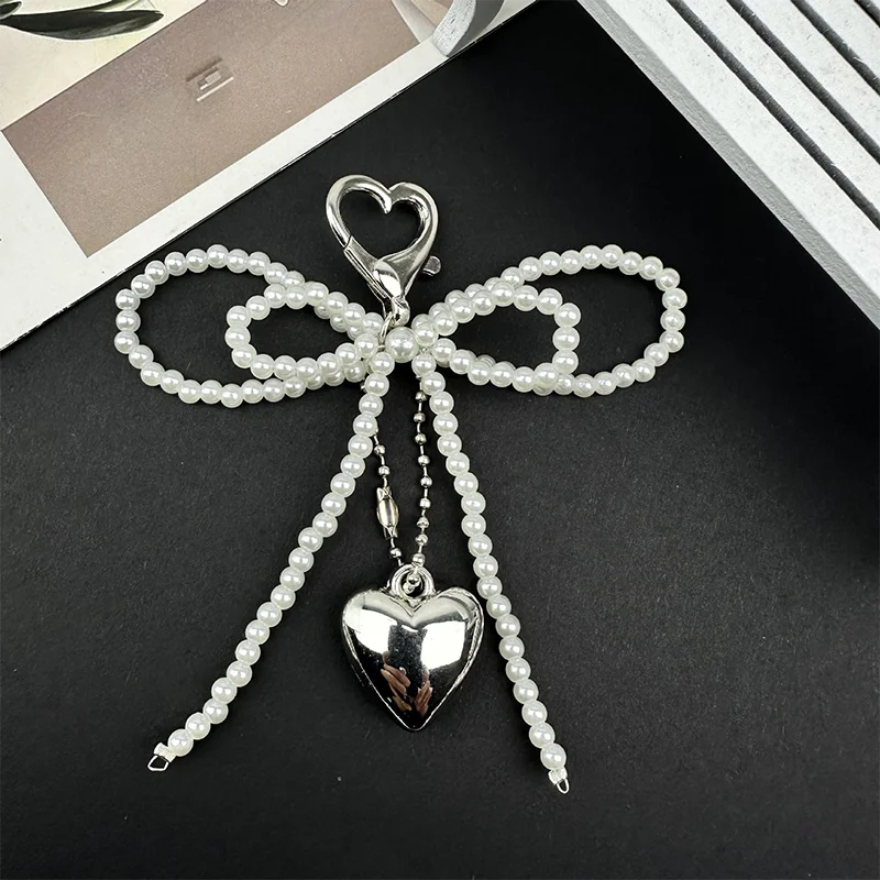 حقيبة جديدة على شكل فيونكة لؤلؤية على شكل قلب مصنوعة يدويًا لحقيبة الهاتف وحقيبة الملابس والأحذية وإكسسوارات الحقائب