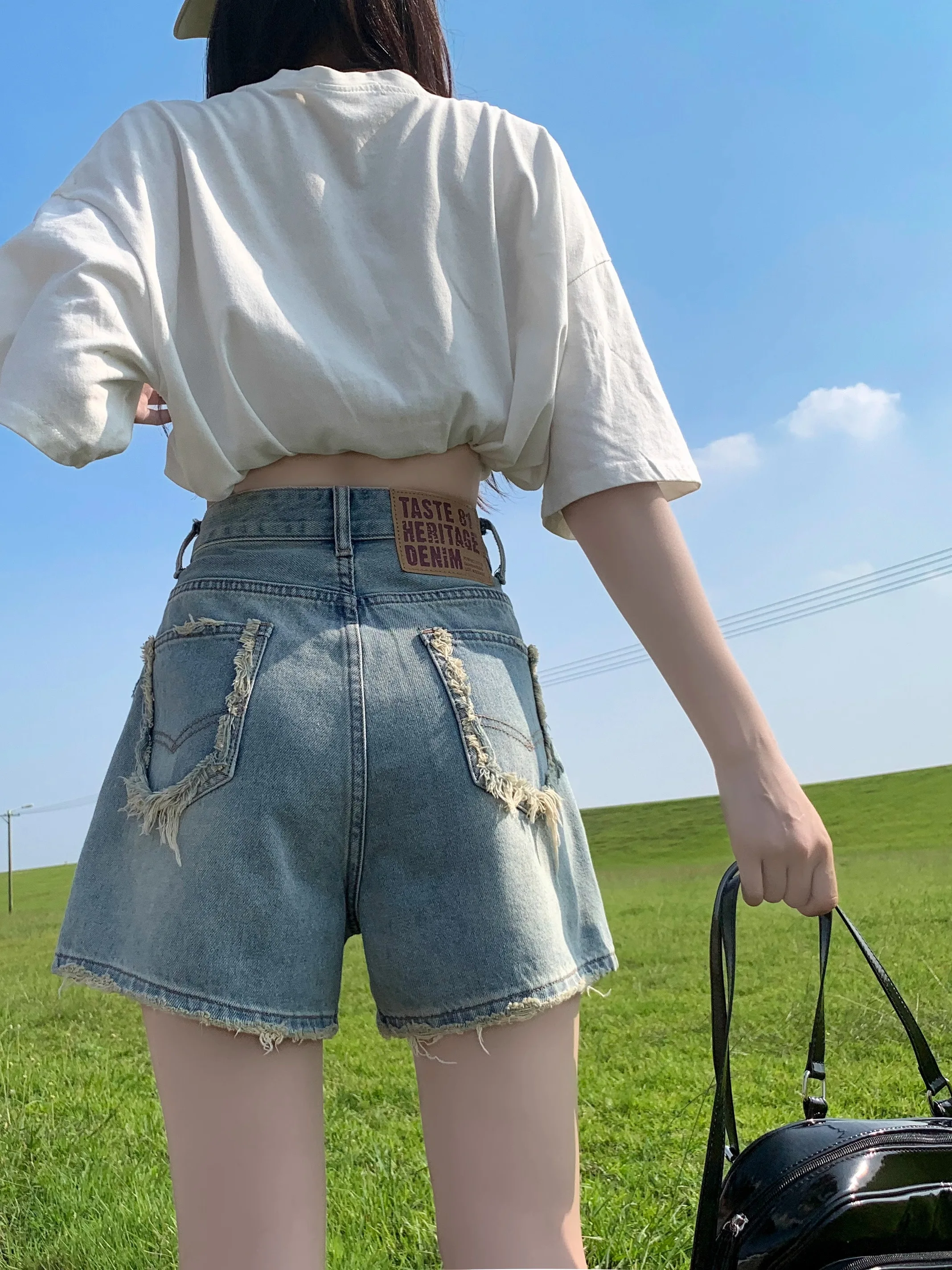 

Джинсовые шорты с высокой талией и широкими штанинами, с рваными краями, женские, летние, тонкие, в стиле ретро, маленький размер, стройнящие, универсальные, А-силуэт, повседневные, модные