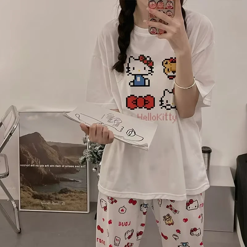 نسخة صيفية جديدة من تي شيرت Hello Kitty النسائي القطني برقبة دائرية النسخة الكورية من نماذج الرسوم المتحركة Hello Kitty ملابس علوية فضفاضة غير رسمية