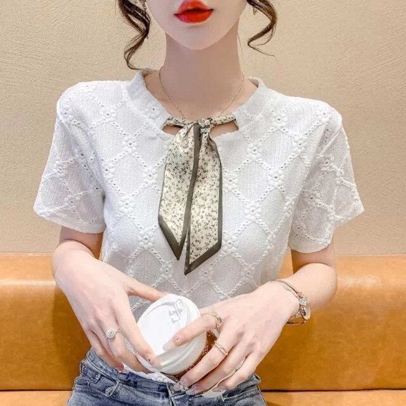 2023 Summer Fashion Korean Edition Round Neck Lace Up Reduced Age Lace Hollow Jacquard Short Sleeve Women\'s Solid Color Shirt