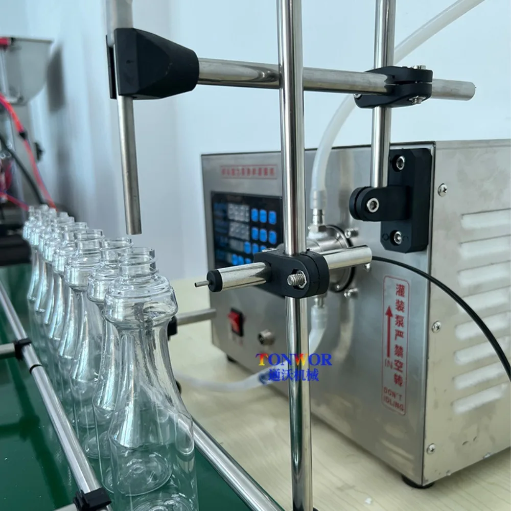 Small capacity liquid induction filling machine,perfume essential oil penicillin bottle automatic canning machine pipeline