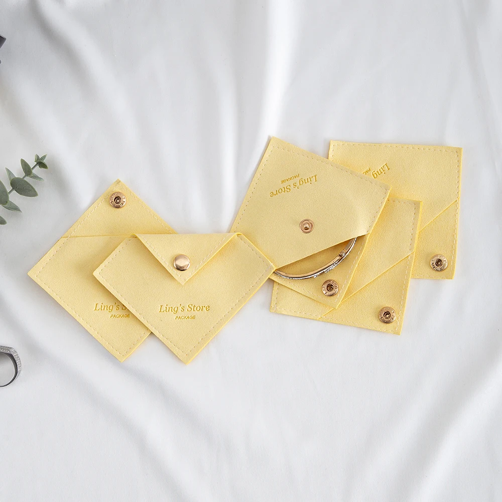 100 pçs amarelo personalizado triângulo jóias snap saco brincos anel pulseira chaveiro colar de cristal batom cílios embalagem