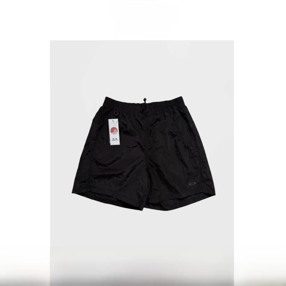 

Humans Mades Металлический Нейлон Spor Повседневная одежда Qui Dry Дышащая длина пять четвертей Свободная посадка Летняя модная мужская одежда