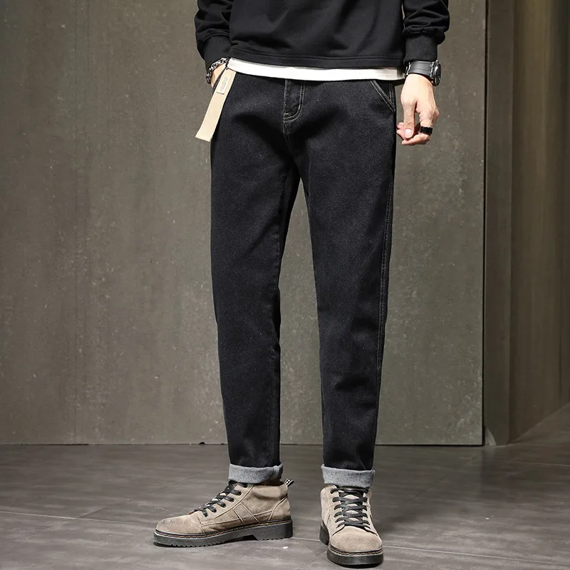 Jeans Men Spring and Autumn New Fashion Brand Loose Straight Tapered Pants Men Casual Harlan Elastic Joker Pants.