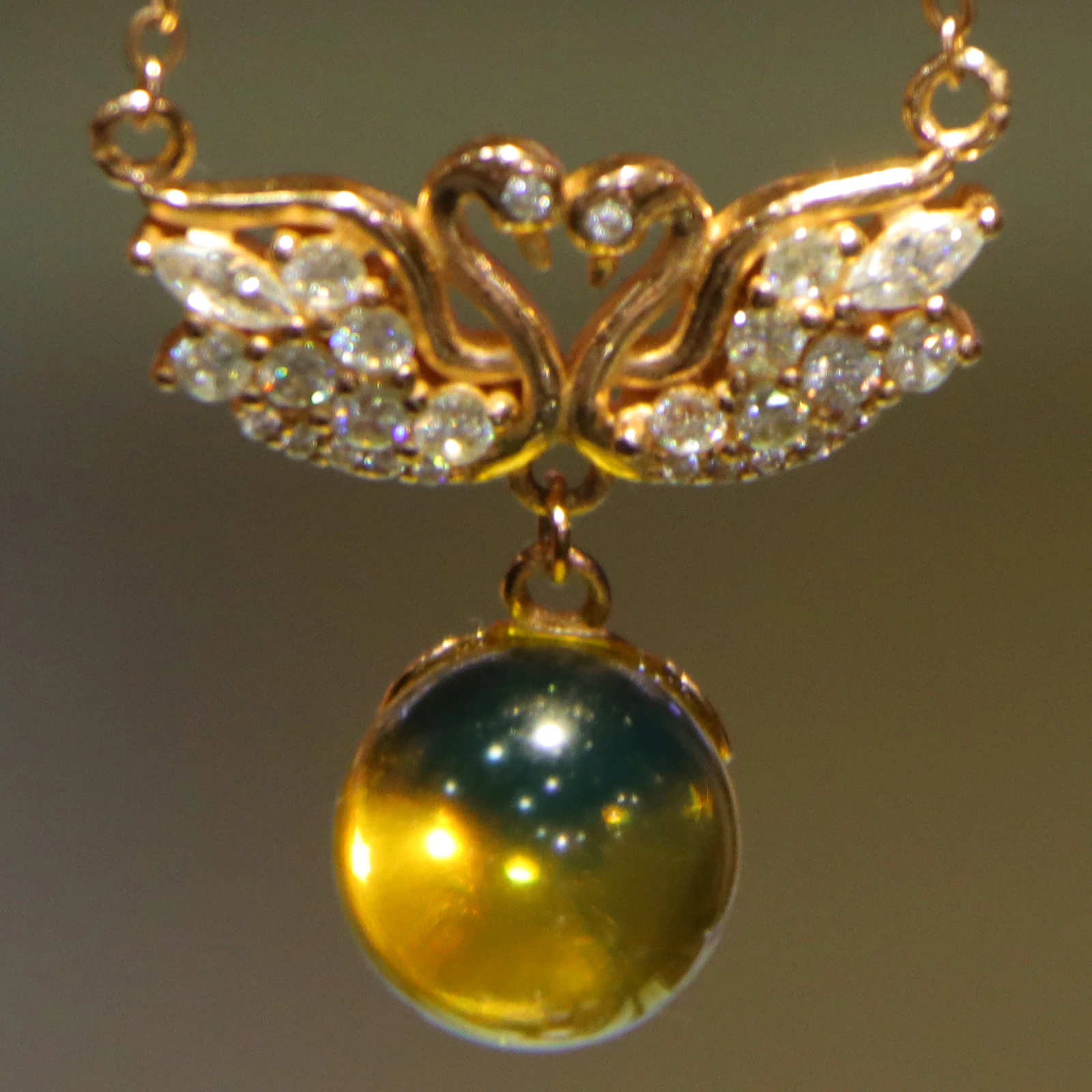 

Pure Silver Natural Mexican Blue Amber Swan Pendant with 10mm Bead