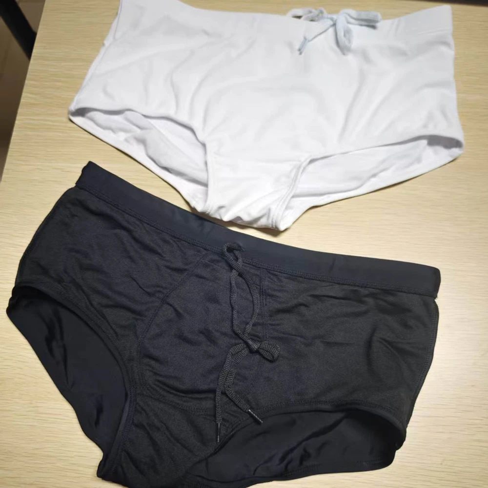 Classic Foreign trade men's black nylon boxer swimming trunks simple loose fashion swimming trunks cross-border supplyUXH604
