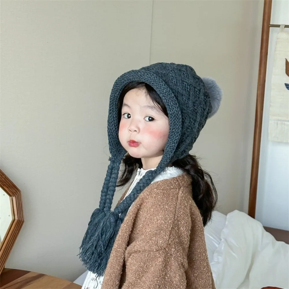 

Fashion Autumn Winter Baby Crochet Hat Pom-pom Soft Warm Hand Knitted Cap Outdoor Tassel Pigtail Ear Protection Cap Kids