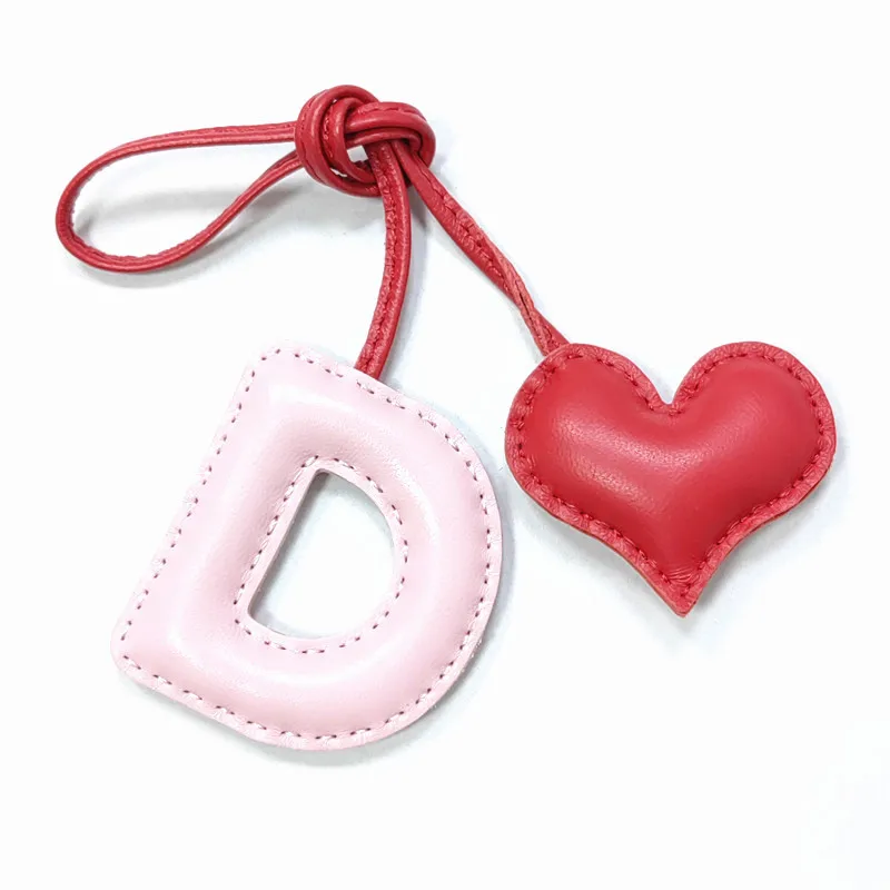 Genuine leather D with heart-shaped letter style bag decoration with pure handmade stitching, high-end car keychain accessories