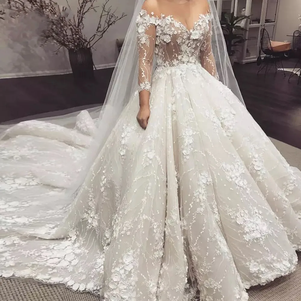 

Luxurious Illusion Long Sleeve Lace Ball Gown Wedding Dresses 2023 Exquisite Boat Neck Flowers Chapel Train Bridal Gown