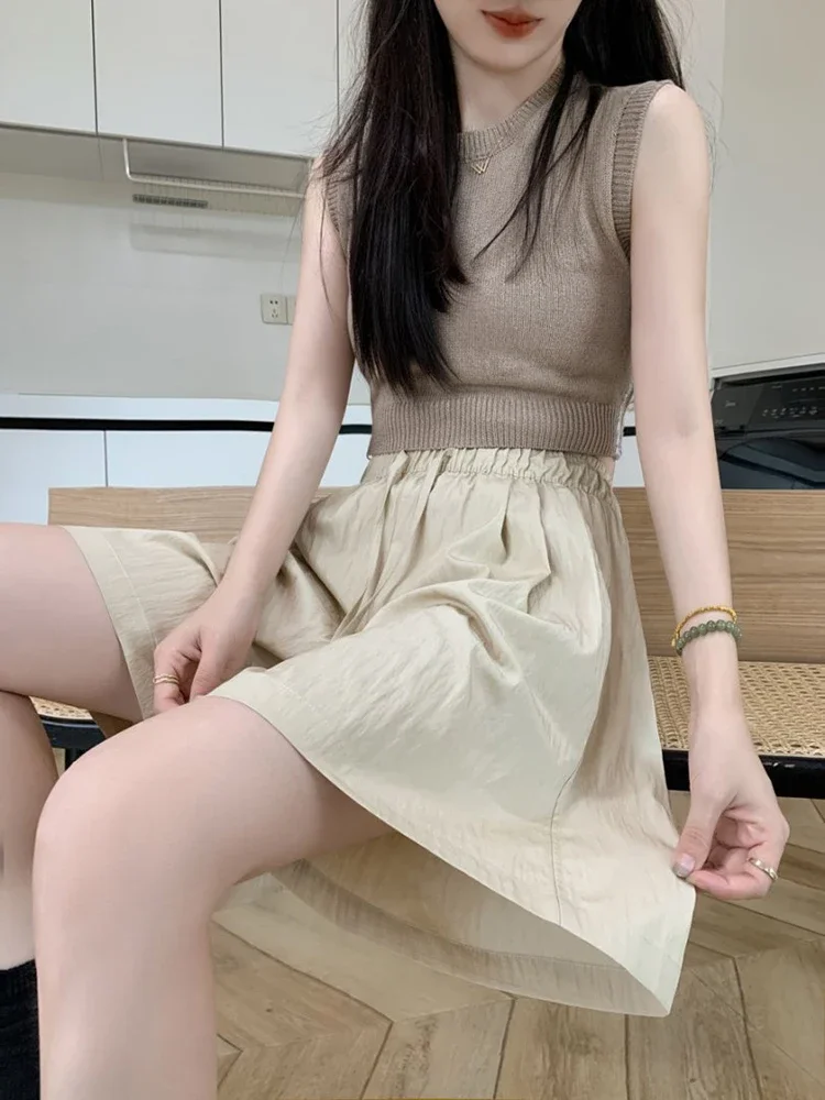 Pantaloncini al ginocchio stile college pop Vita elastica sottile Protezione solare estiva Pantaloni capri corti a gamba larga per le donne