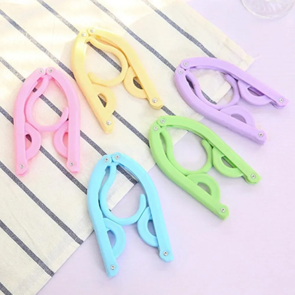 

Folding Clothes Hangers Portable Outdoor Non-Slip Hanger Portable Travel Cloth Foldable Hanger Clothespin Sock Storage Organizer