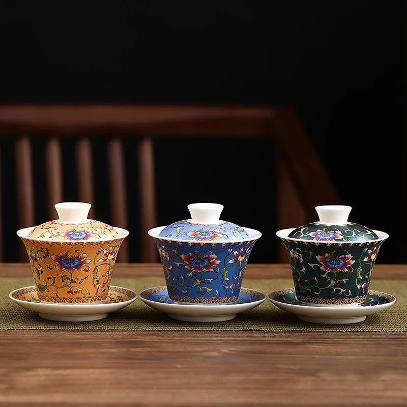 

Enamel covered tea set full of colorful retro large ceramic teacups