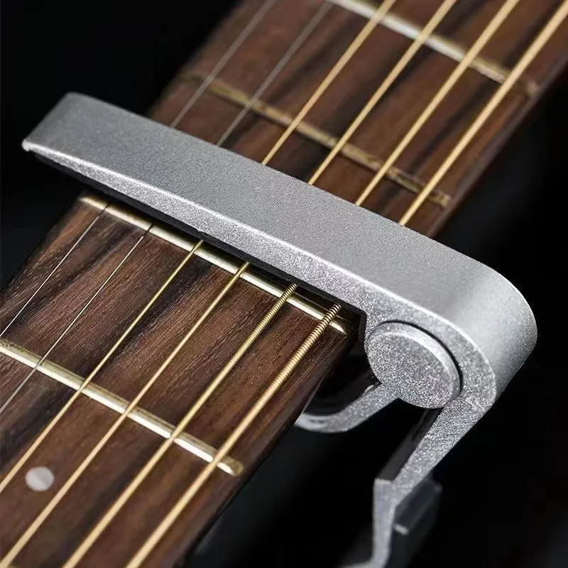 Premium Nylon Guitar Capo - Quick Change Clamp for Easy Tone Adjustment - Fits Acoustic, Classic, Electric Guitars and Ukuleles